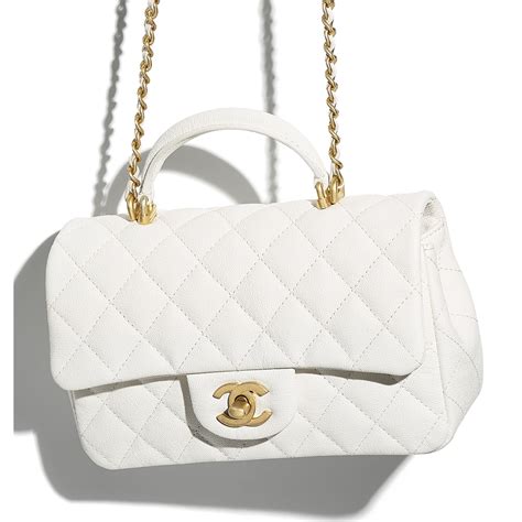 medium flap chanel bag|Chanel mini flap bag with top handle.